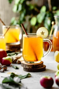 hot apple cider, apple drink, warm beverages, fall drinks, winter drinks, cozy recipes, cinnamon, cloves, nutmeg, mulled cider, apple juice, holiday drink, fall comfort, homemade cider, apple spice, festive beverage, natural drinks, apple recipes, autumn flavors, healthy beverage, immune boost, warm apple drink, seasonal recipe, comfort drink, holiday spirit, cozy drink, nonalcoholic cider, hot beverages, apple goodness, spiced cider, winter comfort, family gatherings, drink recipes, antioxidant drink, vitamin C source, homemade warmth, rustic beverage, organic cider, wholesome drink, natural flavor, apple delight, traditional drink, cinnamon spice, apple harvest, fall season, homemade warmth, apple aroma, cider traditions, apple lovers, spiced warmth, healthy comfort, festive joy
