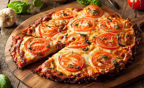 Cauliflower Crust Pizza recipe by Fitness Model Michelle Ulibarri