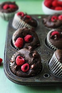 dark chocolate raspberry muffins, chocolate muffins, raspberry muffins, bakery style domes, cocoa powder, chocolate chips, sour cream, Greek yogurt, neutral oil, moist crumb, tender crumb, quick bread, muffin method, oven spring, coarse sugar topping, espresso powder, frozen raspberries, fresh raspberries, make-ahead, freezer-friendly, brunch, breakfast, dessert, snack, school lunch, portable treat, small-batch baking, family favorite, kid friendly, easy recipe, one bowl, minimal cleanup, rich chocolate, bittersweet chocolate, tart berries, flavor balance, baking powder, baking soda, gluten development, gentle folding, room temperature ingredients, cupcake liners, muffin tin, crumb structure, crumb moisture, high altitude adjustment, cocoa bloom, vanilla extract, domed tops, home baking