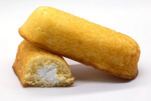 twinkie, snack cake, cream filling, golden sponge, Hostess, snack food, dessert, American classic, sweet treat, nostalgic, convenience store, lunchbox snack, packaged dessert, bakery, indulgence, guilty pleasure, shelf stable, snack time, soft cake, vanilla cream, iconic brand, limited edition, seasonal flavors, deep-fried twinkie, fair food, snack hacks, copycat recipe, homemade twinkies, retro candy, sugar rush, snack aisle, comfort food, midnight snack, coffee pairing, microwave warm, mini twinkies, party dessert, bake sale, calorie count, ingredients list, expiration date, storage tips, food review, product nostalgia, snack culture, viral snacks, foodie, sweet tooth, snack cravings, yellow cake