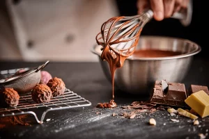 Tags: chocolate, cacao, cocoa, dark chocolate, milk chocolate, white chocolate, flavanols, polyphenols, epicatechin, theobromine, caffeine, endothelial function, insulin sensitivity, non-alkalized cocoa, Dutch process, cocoa butter, cocoa solids, fermentation, conching, tempering, ganache, enrobing, water activity, shelf-life, bean-to-bar, single origin, sustainability, direct trade, Fairtrade, agroforestry, Ivory Coast cocoa, Ghana cocoa, Ecuador cocoa, Peru cocoa, Dominican Republic cocoa, Cameroon cocoa, Indonesia cocoa, roasting profile, flavor notes, pastry, confectionery, sensory analysis, storage tips, tasting, percentage cacao, high-cacao bars, ethical sourcing, HACCP, chocolatier training, professional classes, Valrhona, Chocolate Academy